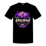 A black graphic t-shirt with a purple brain on it and the words "Epilepsy - Hidden, not rare". 'Epilepsy' is written in yellow and purple ombre text where the yellow starts on top and fades to purple on the bottom. 'Hidden' is written in grey text, 'not' is written in white text and 'rare' is written in purple text.